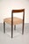 Vintage Lübke chair made of wood with a beautiful grain. This chair has been reupholstered with a modern fabric. Some...