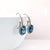 Contemporary 9.6Ct Oval London Blue Topaz Earrings With Diamond Accents in Solid 14k Gold For Sale - Image 3 of 4
