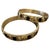 Contemporary Two 1990s Iconic Gold Plated Metal and Black Enamel Bangle Bracelets by Chanel For Sale - Image 3 of 11