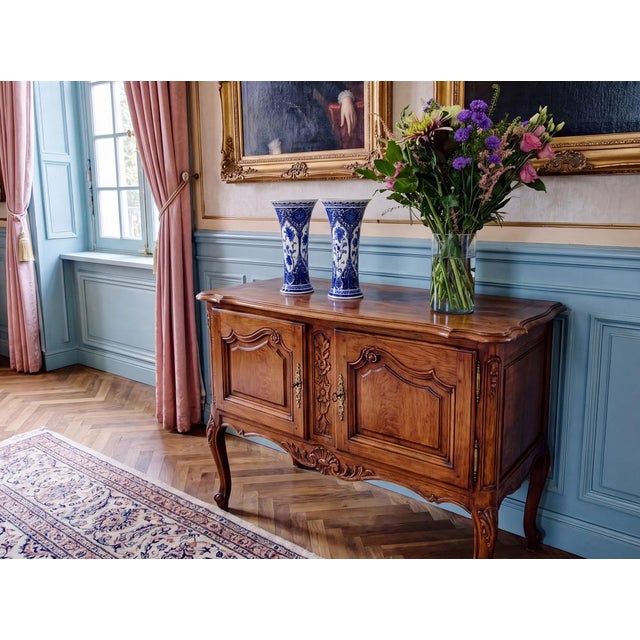 An impressive pair of 30 cm tall Boch Delft Blue Pottery trumpet vases, made for Royal Sphinx Maastricht in Holland and...