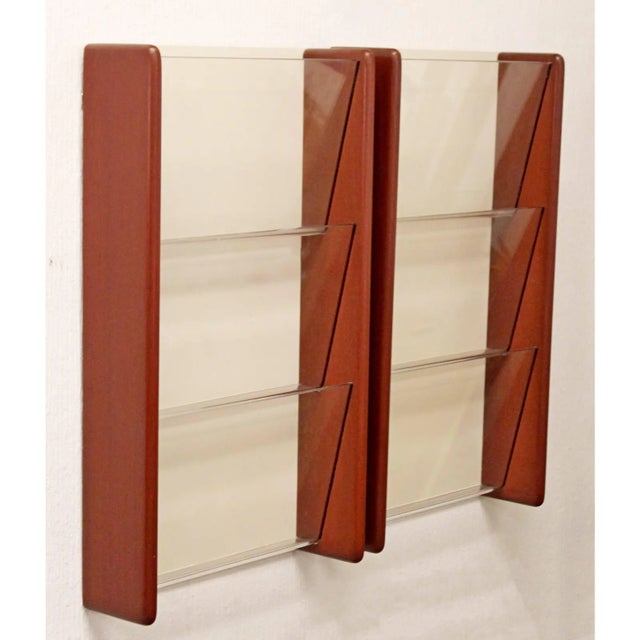 For your consideration is a very stylish pair of midcentury modern wall-mounted, walnut and white laminate, magazine racks...