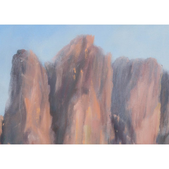 Stunning vertical landscape of dramatic rock formations towering over the desert below by Ken Lucas (American, 20th...