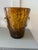 Stunning blown glass champagne bucket in browns and golds reminiscent of a leopard print. The quality of the piece is seen...