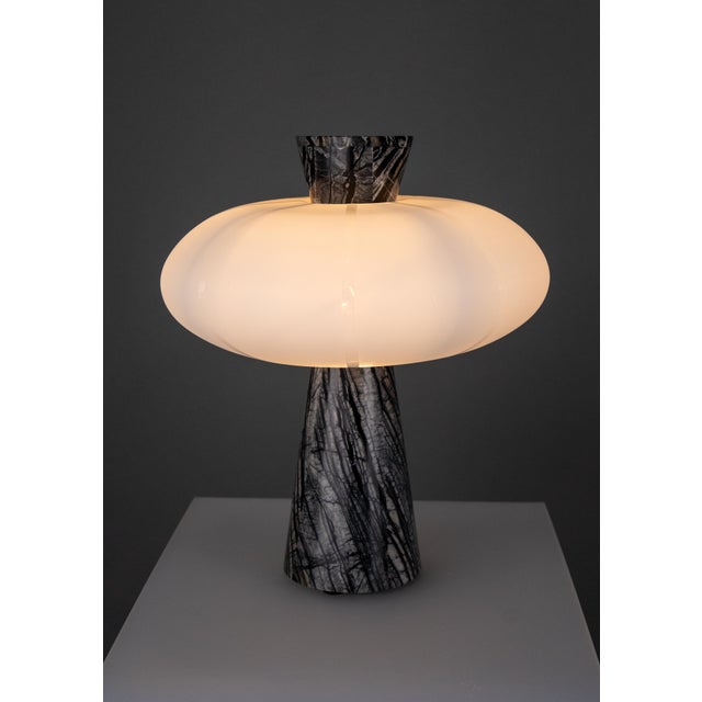 Grenadilla Black Striated Marble and Hand-Blown Opal Glass Table Lamp from ZAVADSKI, in New conditions. Designed from 2000...