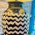 These are Currey &amp; Company oversized ceramic table lamps featuring a hand-painted black and white chevron pattern. A...