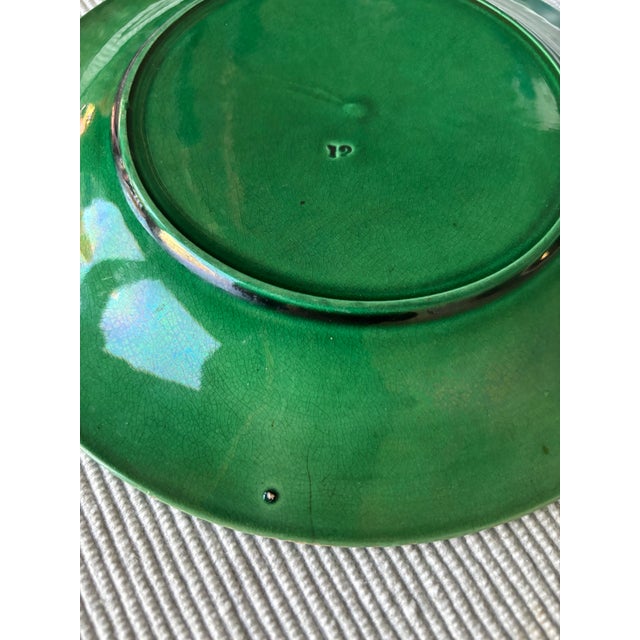 A beautifully hand-crafted antique Portuguese majolica plate, dating to the late 19th or early 20th century (circa...