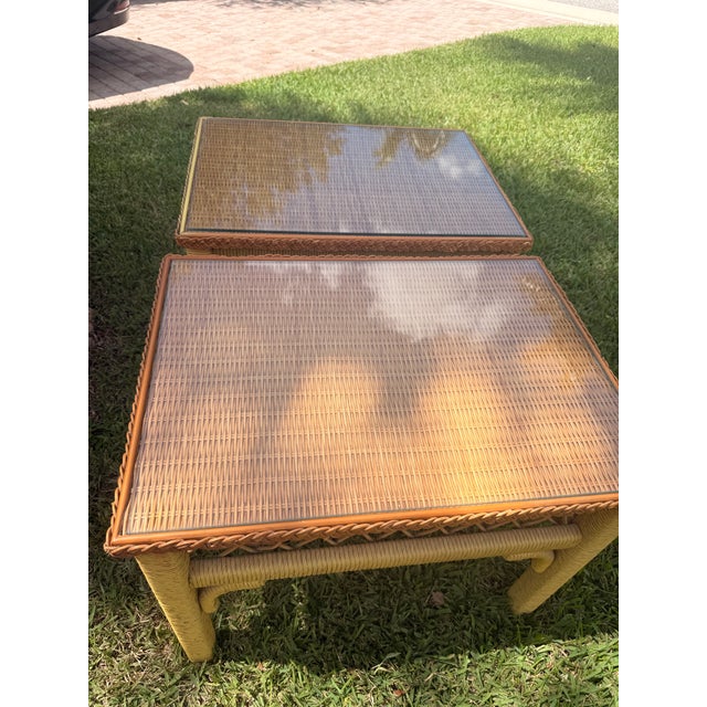 Elevate your living space with this beautiful pair of vintage 1960s bohemian-style end tables styled after Henry Link....