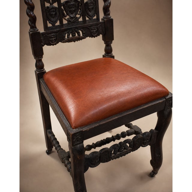 Pair of Antique Jacobean Revival Carved Oak Hall Chairs With Heraldic Crest Backs & Leather Seats For Sale In Los Angeles - Image 6 of 7