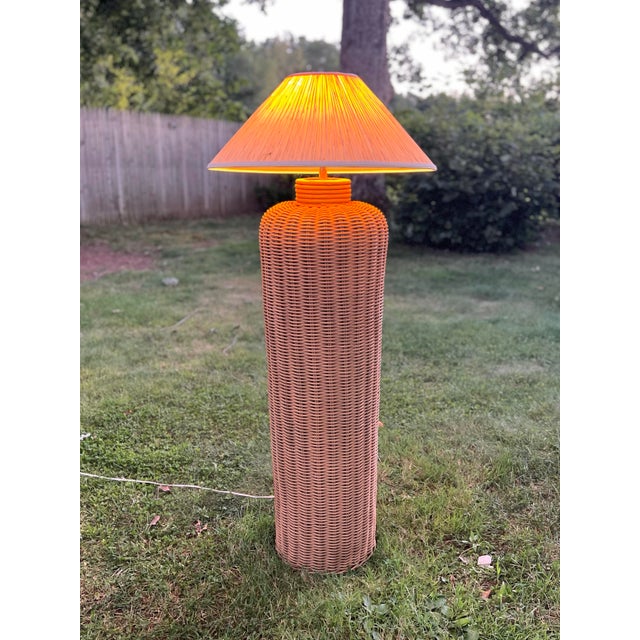 This is a beautiful mid-century wicker floor lamp. I’ve painted this to be a natural wicker color. Also the shade is not...