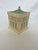 Bring charm and whimsy to your décor with this unique vintage house-shaped box. Crafted with substantial weight and...