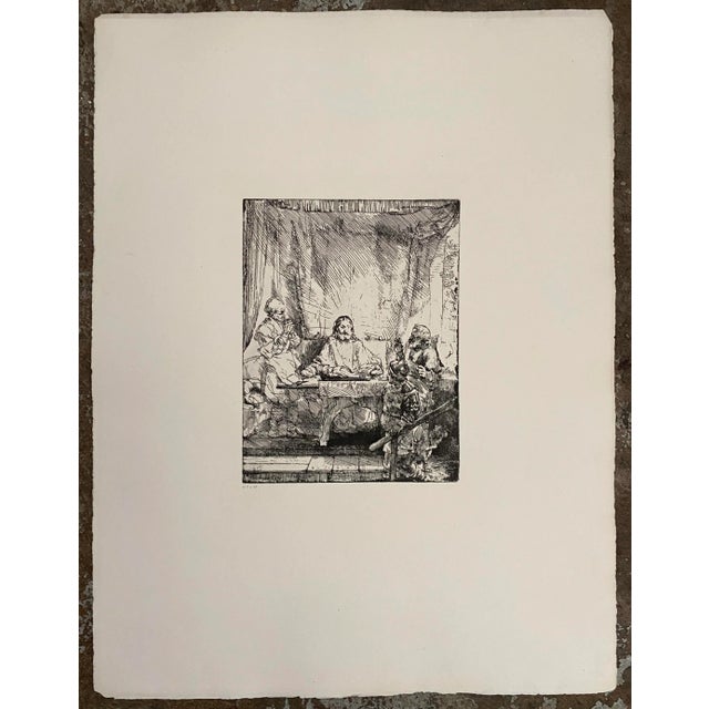 Antique engraving of the etching "The Supper at Emmaus" by Rembrandt van Rijn. The original was completed in 1654, this...