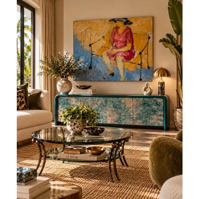Striking 1980s Postmodern sideboard featuring a sculptural rounded silhouette finished in a rich high-gloss green lacquer....