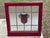 20th Century Stained Glass Window in a large, original wooden frame. Double sided, featuring both smoked and clear glass...
