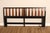 Striking Mid Century Modern king size headboard featuring a bold ebony-finished frame contrasted by sculptural walnut-...