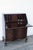 This Secretary Desk is made out of wood, solid wood, mahogany, and veneer. It was made by Pray's Furniture and it is...