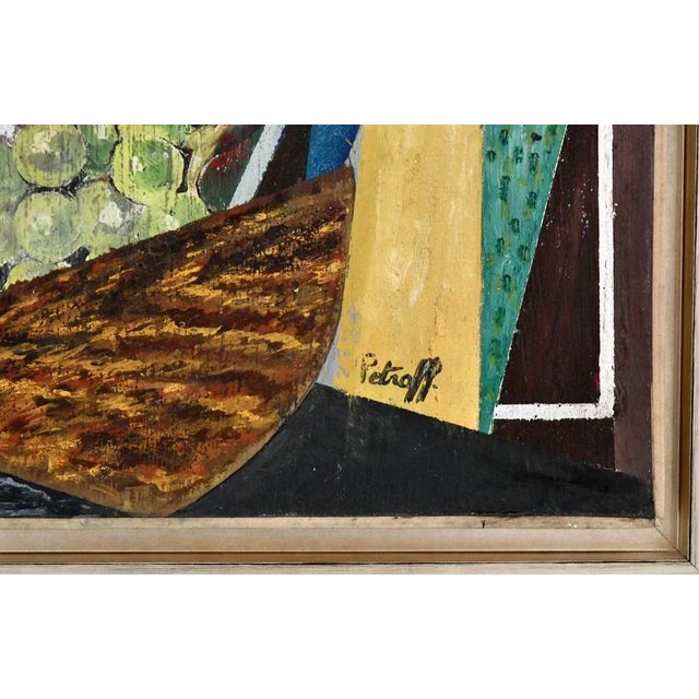 Painting cubist composition with Modigliani face, musical instruments, playing cards and fruit by the Russian artist...