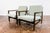 A pair of club chairs "type B7522," designed by Zenon Bączyk and produced in Poland in the 1960s, exemplifies the...