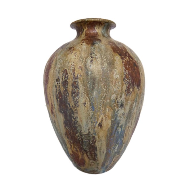 Art Deco Period Gres Stoneware Vase by Belgian ceramist Roger Guérin from the 1930s. The creation is of a bulbous form...