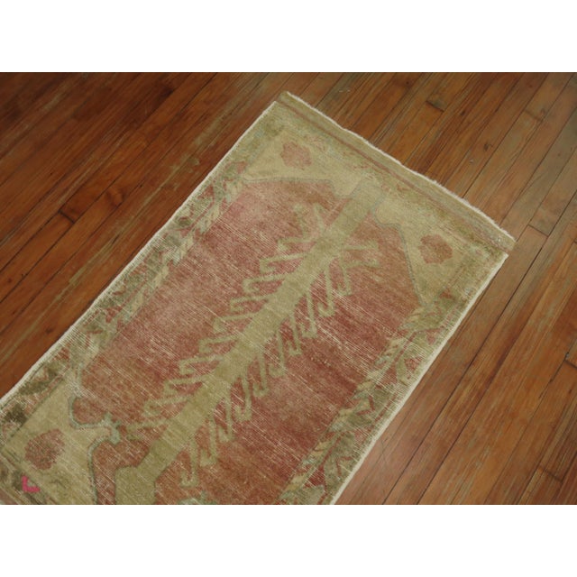 Mid 20th century light pink Turkish prayer niche motif rig. Measures: 2'4'' x 4'.