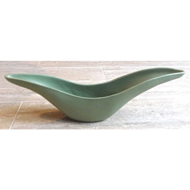 Vintage Mid-Century Modern abstract ceramic boat cachepot. Elegantly curved shape with high abstract bow and stern. No...