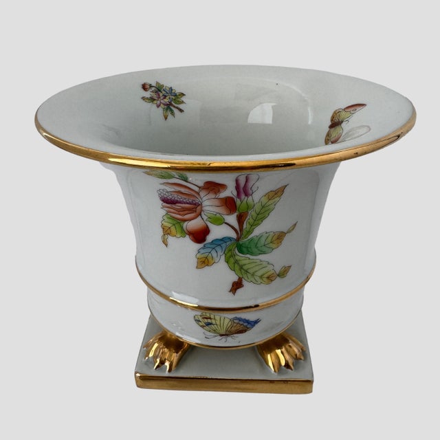 A striking vintage Herend porcelain cachepot in the celebrated Queen Victoria pattern, featuring beautifully hand-painted...