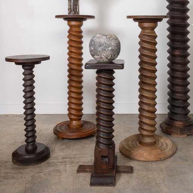 Beautiful wood pedestal table from France, 1940s. Square top with twisted column on a square base. Original dark wood...