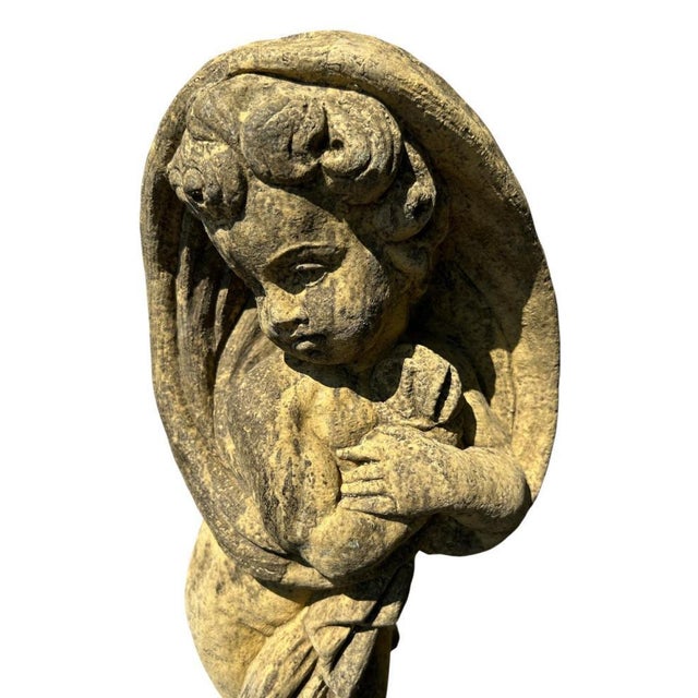 This charming set of four cast stone garden figures depicts the allegorical Four Seasons, each portrayed as a cherubic...
