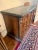 A beautifully characterful piece that brings Old World elegance to any space. This carved oak sideboard features a...