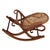Victorian Thonet No.7001 rocking chair foot stool featuring an elegant, sculptural frame crafted from warm-toned bentwood...