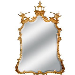 The Shun Wo Dynasty is a study in the Chinese Chippendale tradition, its tall gold frame crowned by an elaborate pierced...
