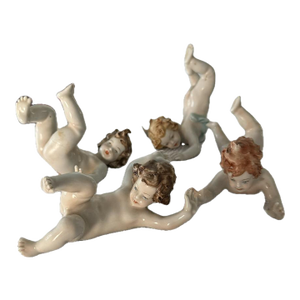 Late 19th Century Antique Capo Di Monte Set of 4 Tumbling Frolicking Putti Figurines