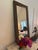 A pair of substantial, contemporary rib-framed mirrors of cast metal. Very heavy. These sleek pieces complement any type...