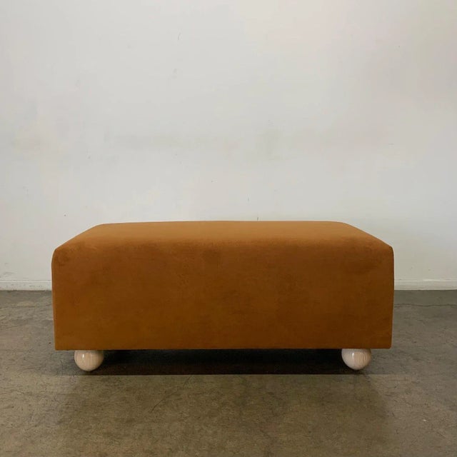 W43 D21 H19 Handcrafted ottoman by Vintage On Point. Square frame on some contrasting ball round legs.