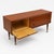 Vintage Low Teak Sideboard 1960s – Mid-Century Design. This authentic vintage sideboard from the 1960s is crafted from...