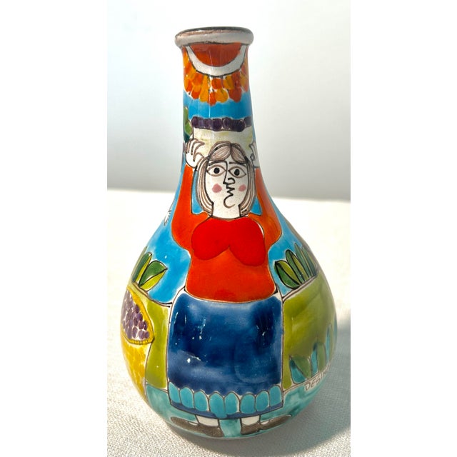 Bold, expressive, and full of storytelling charm—this mid-century modern Italian hand-painted DeSimone vase features a...