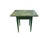 A charming antique primitive table featuring a beautifully worn original green painted surface with substantial age and...