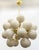 Italian sputnik chandelier with 24 Murano glass globes mounted on brass frame in unlacquered natural brass finish / Made...