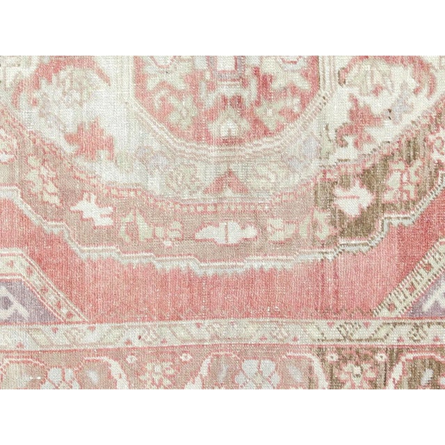 This beautiful vintage Turkish Oushak Rug is hand-knotted with 100% wool on a wool foundation to provide a soft, warm...