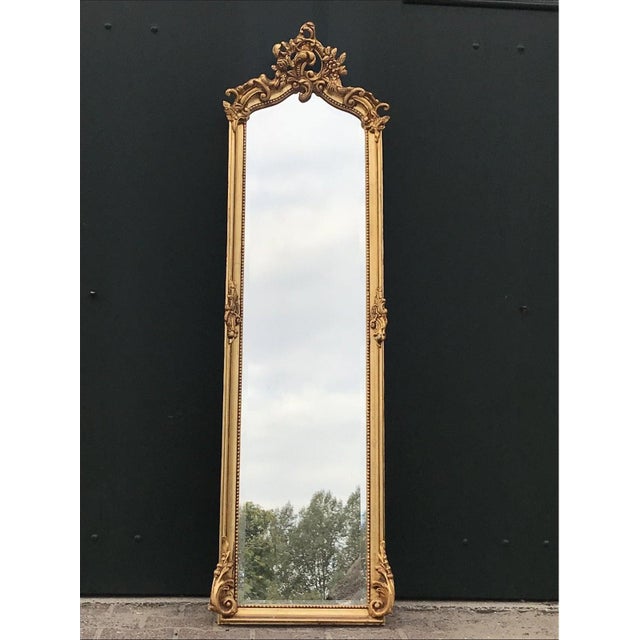 Elevate your interior with this magnificent pair of Late 20th-Century Rococo Revival full-length mirrors, handcrafted by...