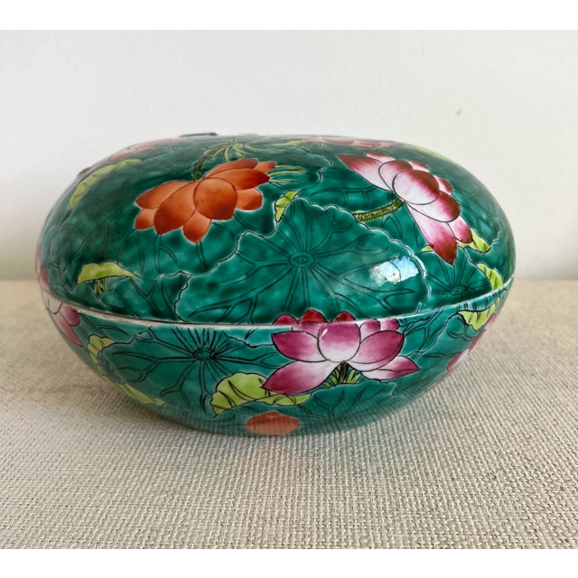 Large vibrant green lily pads and bright Pink and Orange Lotus Flowers porcelain lidded box. Excellent vintage condition....