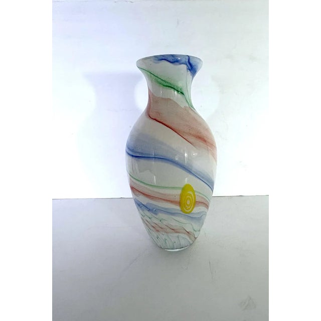 A hand -blown Murano Glass Vase. Milk base with a swirl pattern.