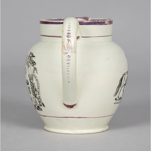 English pearlware pink lustre jug decorated with Masonic symbols on the front and William III, Prince of Orange, mounted...