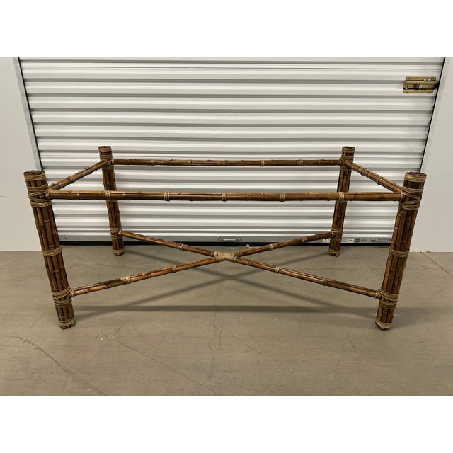 An unmarked McGuire dining table base in pristine condition. Classic McGuire styling featuring an X style base supporting...