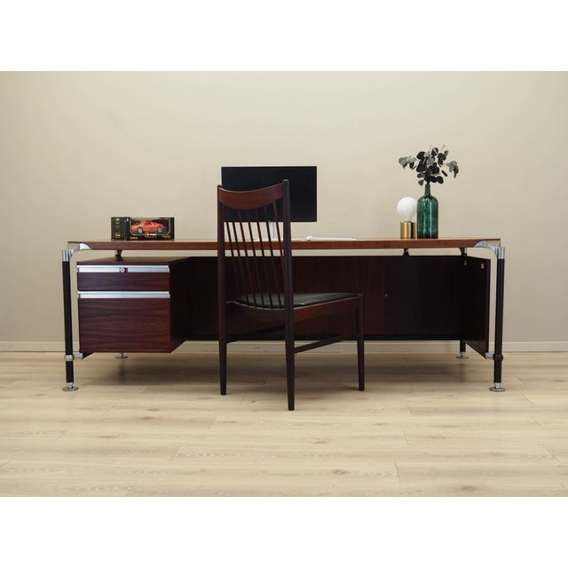 The desk was manufactured by the renowned MIM Roma factory in the 1970s, based on a design by leading Italian designers...