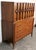 A classic Mid-Century Modern highboy dresser from Kent-Coffey’s Perspecta line, showcasing the collection’s signature...