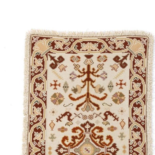 Pair of Arraiolos rugs (160 cm). Portuguese, 20th century; made of Arraiolos wool yarn; polychrome decoration in shades of...