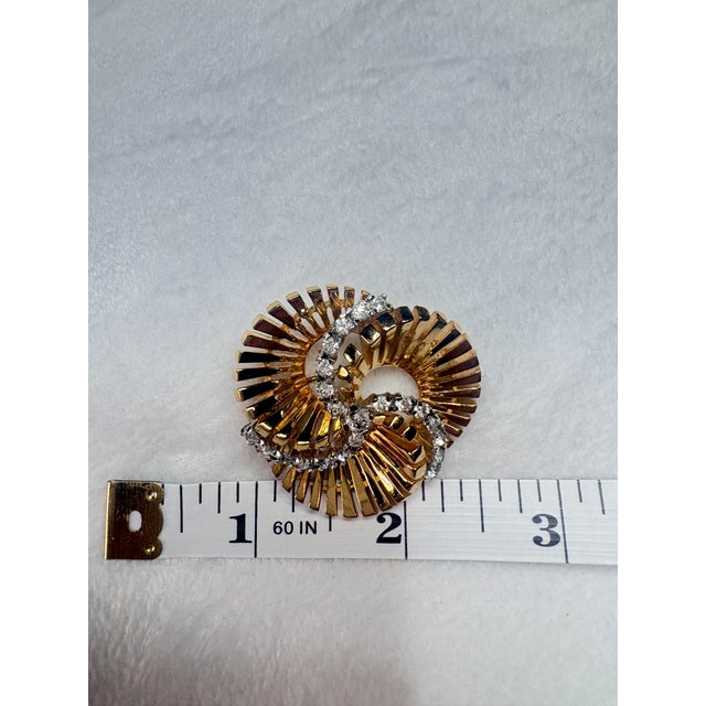 A distinctive mid‑century JOMAZ (C) brooch showcasing one of the brand’s most sculptural and uncommon design motifs....