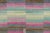 This 4x7 Mid-Century Modern rug showcases a bold abstract design in sky blue, pink, camel, and ivory. Layered geometric...