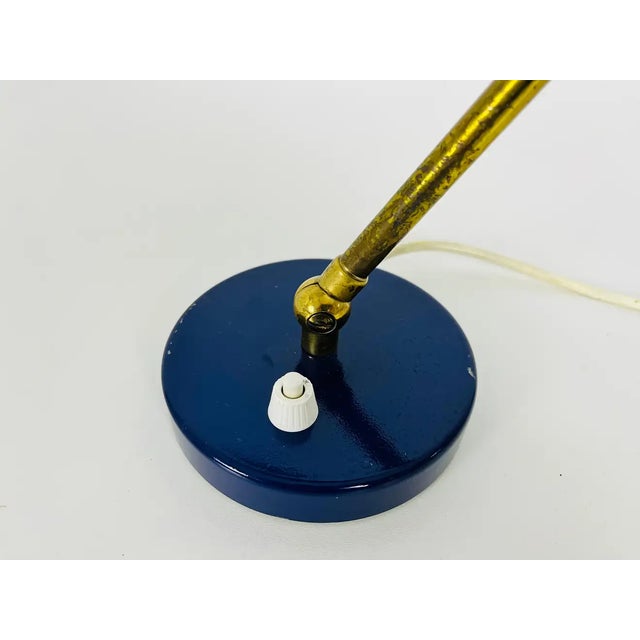 Extraordinary blue table lamp made by Stilnovo in the 1960s. The lighting has an exceptional design with beautiful brass...