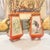 These two tapered squared feature Hadar and Husek of Austrian origin from the early 20th century. Porcelain with cut out...